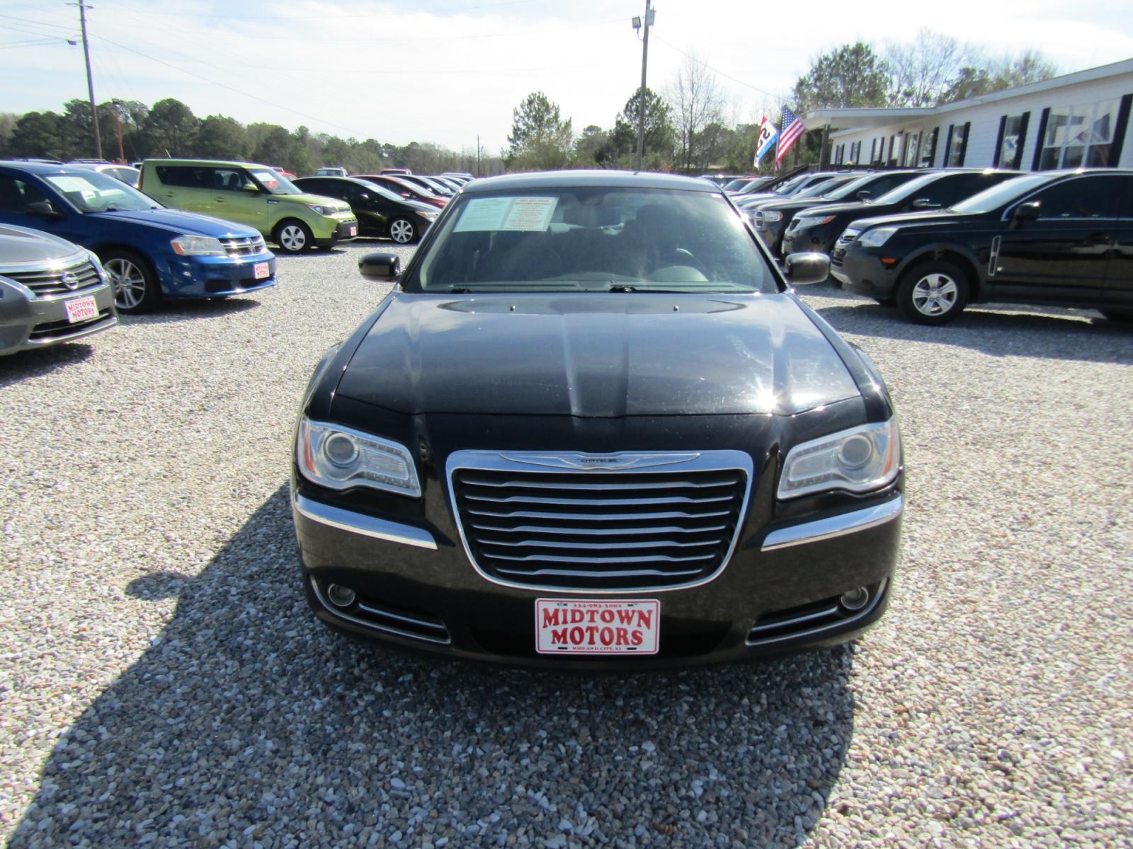 2013 Black /Tan Chrysler 300 RWD (2C3CCAAG5DH) with an 3.6L V6 SOHC 24V engine, Automatic transmission, located at 15016 S Hwy 231, Midland City, AL, 36350, (334) 983-3001, 31.306210, -85.495277 - Photo #1